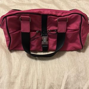Kenneth Cole Reaction barrel bag.